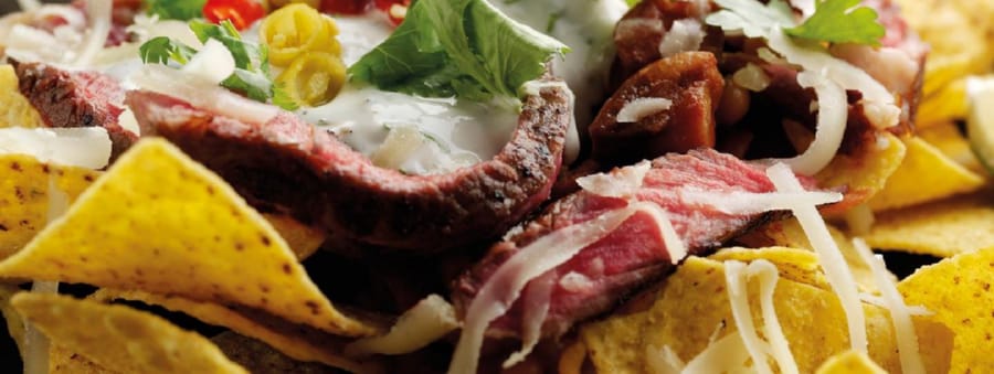 Nachos con Carne Bañada en Cerveza